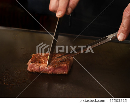 Teppanyaki steak cooking image 55503215