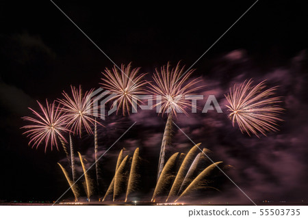 Fantastic Multicolor Firework Celebration from the big boat over the sea, celebration concept Fantastic Multicolor Firework Celebration from the big boat over the sea, celebration concept 55503735