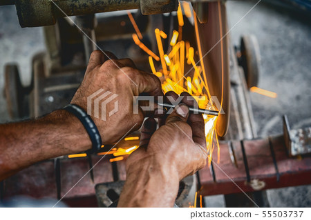 Professional machinist hand working saw machine or metal cutting working in metalworking factory, lathe metalworking industry concept Professional machinist hand working saw machine or metal cutting working in metalworking factory, lathe metalworking industry concept 55503737