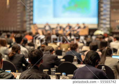 Rear view of Audience listening Speakers on the stage in the conference hall or seminar meeting, business and education about investment concept Rear view of Audience listening Speakers on the stage in the conference hall or seminar meeting, business and education about investment concept 55503742