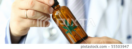 Male doctor hold bottle with marijuana oil Male doctor hold bottle with marijuana oil 55503947