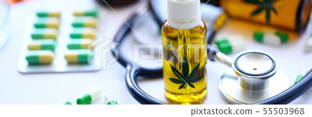 Marijuana stethoscope oil pills are on table Marijuana stethoscope oil pills are on table 55503968