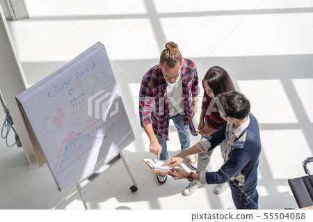 Top view scene of Asian and Multiethnic Business people with casual suit working with brainstorming and pointing to the design concept in the modern workplace, people business group concept 55504088