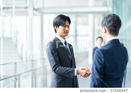Businessman to shake hands negotiate business image 55506447