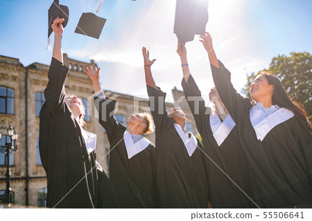 Graduates saying goodbye to their university life. 55506641