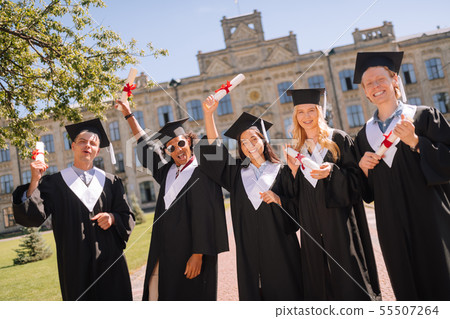 Young people glad finally graduating the university. Young people glad finally graduating the university. 55507264