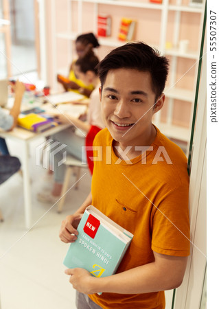 Portrait of handsome Asian man that visiting school 55507307