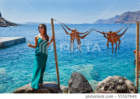 Young woman, on the background of the sea Young woman, on the background of the sea 55507648