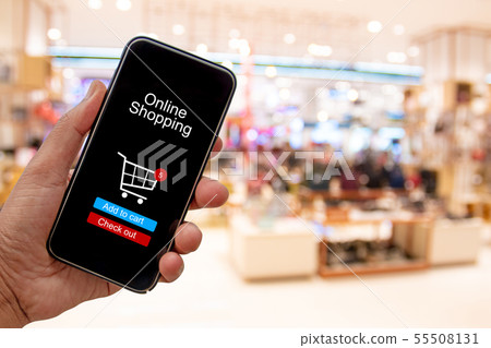 Person using smartphone buying and making a Person using smartphone buying and making a 55508131
