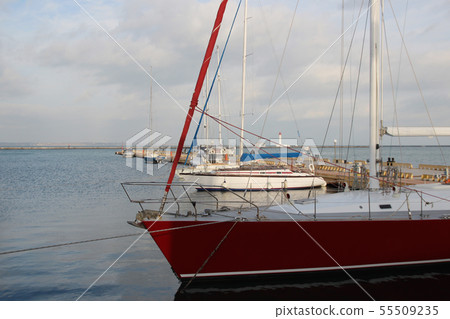 Small private yachts pier in winter Pier with rows Small private yachts pier in winter Pier with rows 55509235