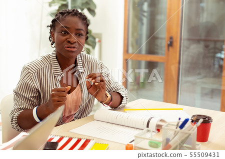 Competent teacher actively gesticulating during language practice 55509431