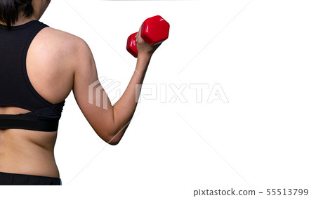 Fit woman arm exercise with red dumbbell in gym. Fit woman arm exercise with red dumbbell in gym. 55513799