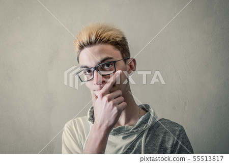 Boy by thoughtful look Boy by thoughtful look 55513817