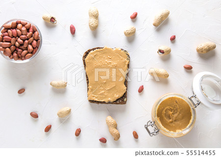 Whole grain bread with walnut paste with peanuts. Whole grain bread with walnut paste with peanuts. 55514455