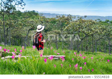 Woman traveler with backpack enjoying  55514810