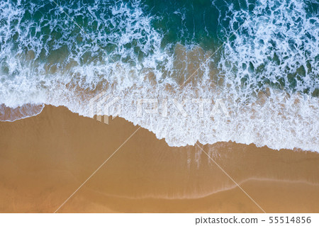 Aerial view of Blue ocean wave on sand beach. 55514856