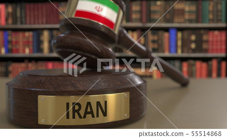 Flag of Iran on falling judges gavel in court. National justice or jurisdiction related conceptual Flag of Iran on falling judges gavel in court. National justice or jurisdiction related conceptual 55514868