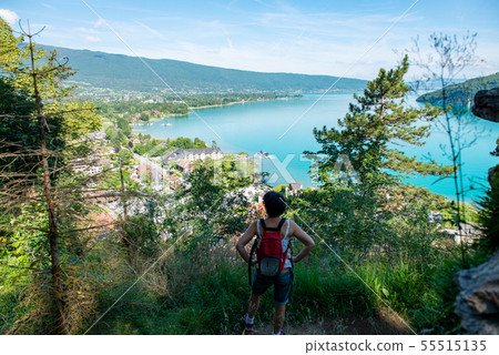 hiker woman looking at lake of Annecy in french 55515135
