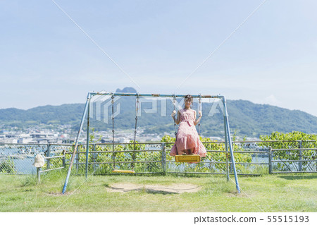 Swinging woman 55515193