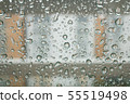 Water droplet pattern on the window of an apartment on a rainy day 55519498