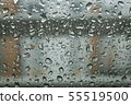 Water droplet pattern on the window of an apartment on a rainy day 55519500