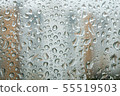 Water droplet patterns on windows on rainy days 55519503