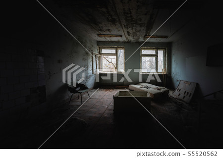 Abandoned room in destroyed hospital 55520562