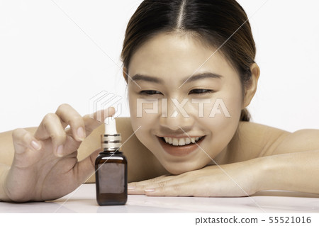 Asian Beauty woman smile with clean skin on white 55521016