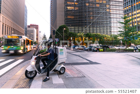 Tokyo cityscape in Japan A motorcycle at the "Otemachi" intersection (the back is Sumitomo Mitsui Banking Corporation main office building) Tokyo cityscape in Japan A motorcycle at the "Otemachi" intersection (the back is Sumitomo Mitsui Banking Corporation main office building) 55521407