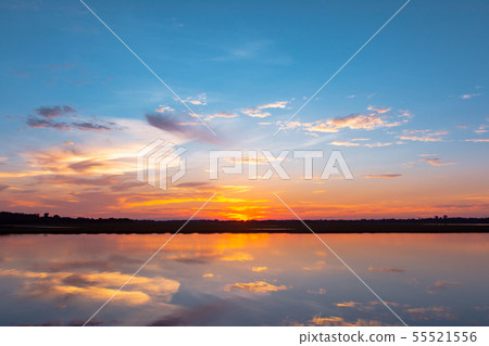 Sunset reflection lagoon. beautiful sunset behind Sunset reflection lagoon. beautiful sunset behind 55521556