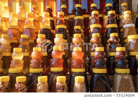 fresh organic honey on farm market 55524004