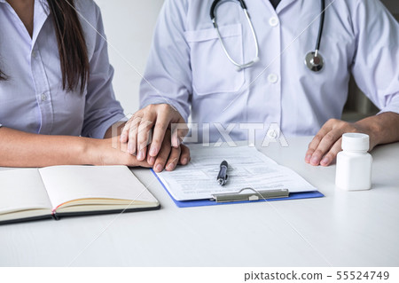 Image of doctor holding patient's hand to 55524749