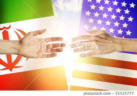 Two hands stretch towards each other against  55525777