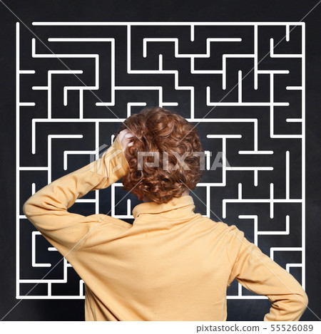 Little boy and maze on chalkboard background Little boy and maze on chalkboard background 55526089