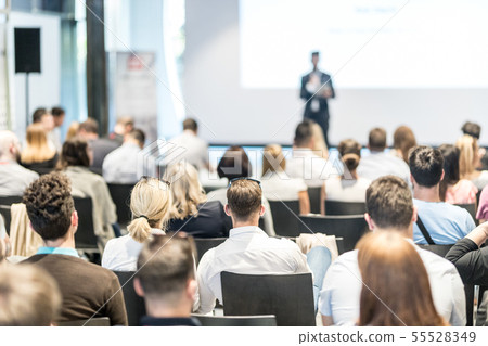 Male business speaker giving a talk at business conference event. 55528349