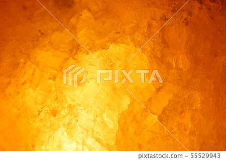 Close-up rock salt lamp that emits meditative light 55529943