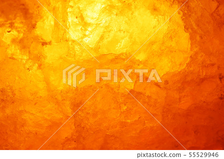 Close-up rock salt lamp that emits meditative light 55529946