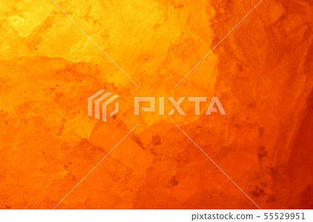 Close-up rock salt lamp that emits meditative light 55529951
