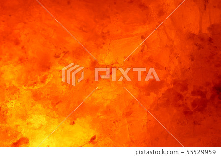 Close-up rock salt lamp that emits meditative light Close-up rock salt lamp that emits meditative light 55529959