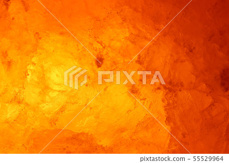 Close-up rock salt lamp that emits meditative light 55529964