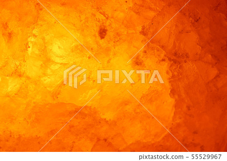 Close-up rock salt lamp that emits meditative light 55529967