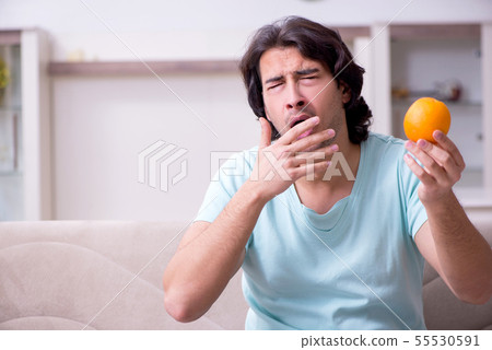 Young man suffering from allergy 55530591