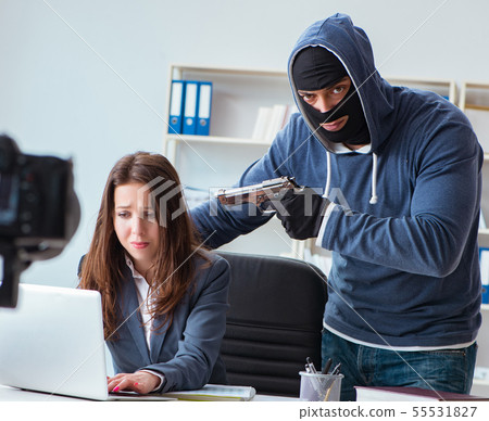 Criminal recording message for ransom with victim businesswoman 55531827