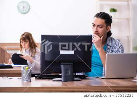 Young male it specialist in the office Young male it specialist in the office 55532225