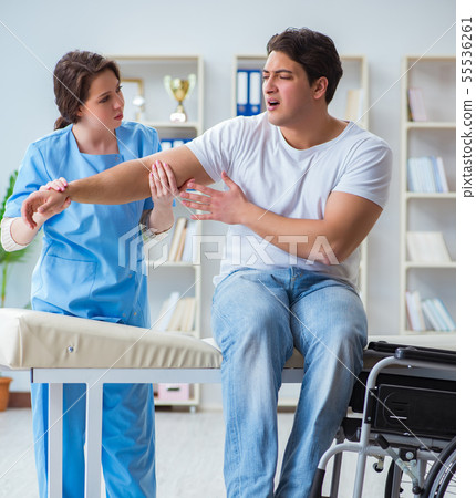 Patient undergoing rehabilitation recovery programme with doctor Patient undergoing rehabilitation recovery programme with doctor 55536261