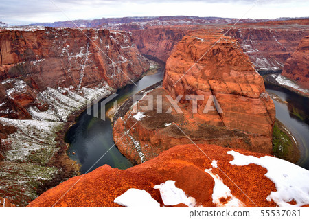 Horseshoe bend meandering the Colorado River in a horseshoe shape Horseshoe bend meandering the Colorado River in a horseshoe shape 55537081