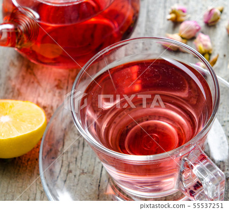 Fruit berry tea in the cup served on table Fruit berry tea in the cup served on table 55537251
