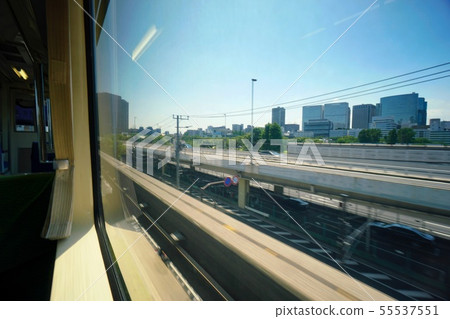 Tokyo Monorail running parallel to the Tokyo Metropolitan Expressway 55537551
