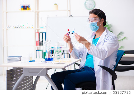 Young male chemist working in the lab 55537755