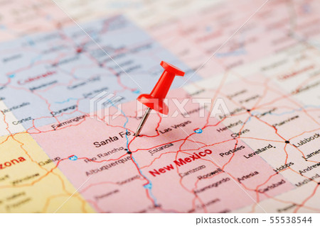 Red clerical needle on a map of USA, New Mexico Red clerical needle on a map of USA, New Mexico 55538544